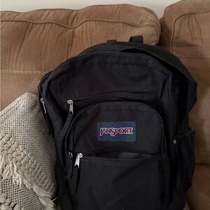 JanSport Black Backpack Durable Canvas Design